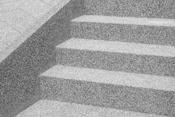 Black and white stone and concrete staircase. modern architecture detail. Refined fragment of contemporary office interior / public building.