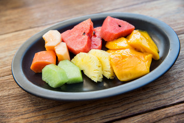 still life with exotic tropical fruits in bowl