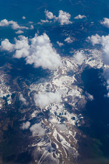 Snow-covered mountains of the plane in Montenegro