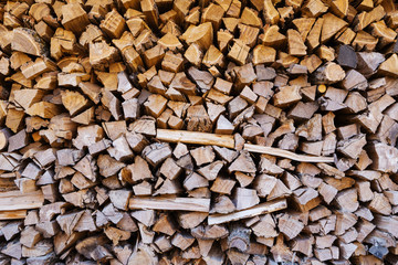 A lot of stacked firewood for the fireplace