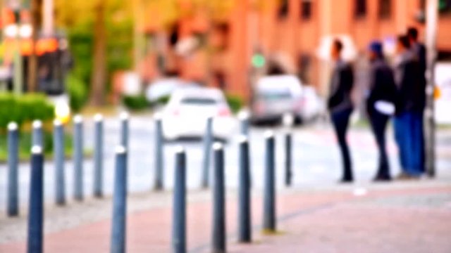 Menschen im Stra&szlig;enverkher in einer Gro&szlig;stadt