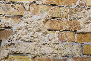 Old brick wall with lime closeup.