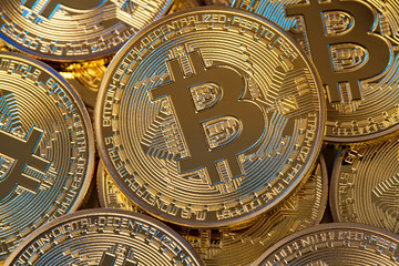  coin representing bitcoin electronic currency, gold colored selective focus. money and blockchain...
