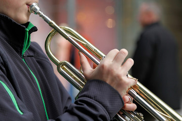 Playing trumpet
