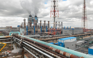 Chemical plant for production of ammonia and nitrogen fertilization on day time. The pipeline connecting the plant's workshops