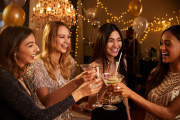 Female Friends Make Toast As They Celebrate At Party
