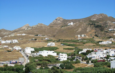 Fototapeta na wymiar A traditional white village of Cyclades island in the countryside, Greece