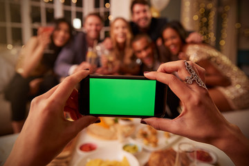 Friends Posing For Photo As They Have Fun At Party Together