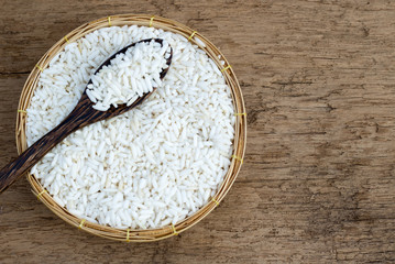 brown rice on wood table
