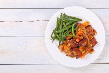 tasty meat stew on white plate
