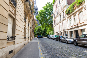 Paris buildings and streets situated next to the Eiffel Tower.