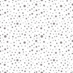 Seamless vector pattern with dots. Simple grey graphic design. Dotted drawn background with little decorative elements. Print for wrapping, web backgrounds, fabric, decor, surface