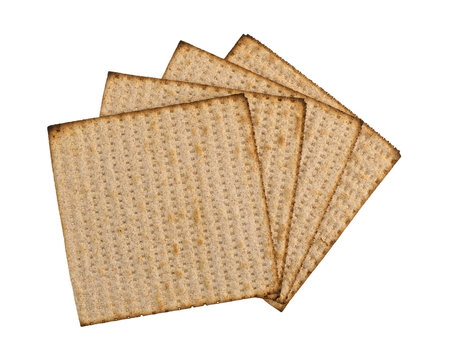 Small Group Of Whole Wheat Matzo Crackers Isolated On A White Background.