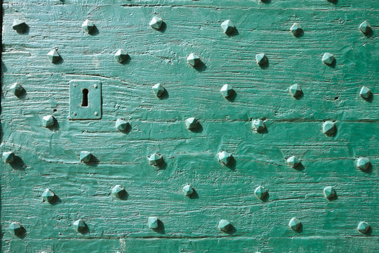 Old Wood Background, Green Texture And Pattern With Key Hole In Antique Door