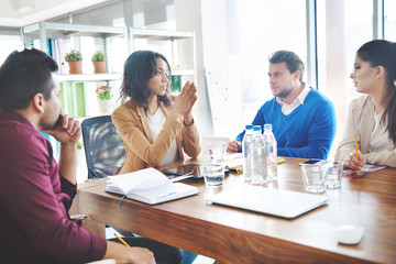 Young business people brainstorming in meeting