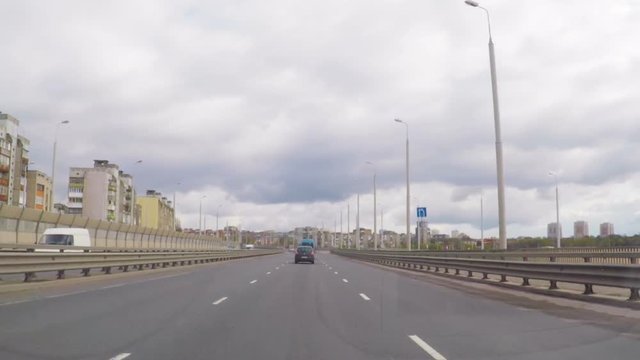 Drivers pov vehicle driving along the streets city