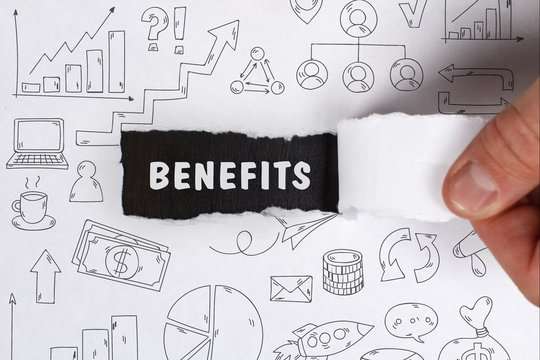 Business, Technology, Internet and network concept. Young businessman shows the word: Benefits
