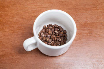 Roasted coffee beans in the bowl