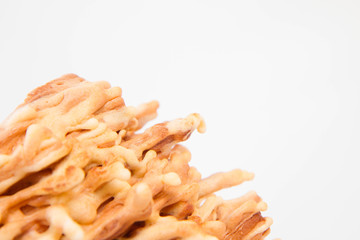 Polish-Lithuanian traditional spit cake ('tree cake') -sekacz (polish) or sakotis (lithuanian) on a white background