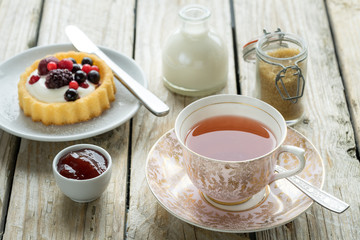 old school style tea at five afternoon service set cake sweet traditional table hotel cheesecake sugar pot china cup