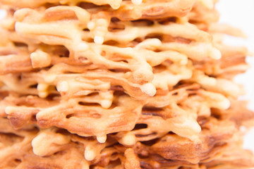 Polish-Lithuanian traditional spit cake ('tree cake') -sekacz (polish) or sakotis (lithuanian) on a white background