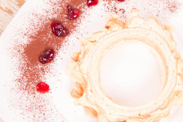 Polish-Lithuanian traditional spit cake ('tree cake') -sekacz (polish) or sakotis (lithuanian) on a wooden background