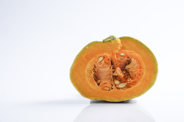 Sweet orange pumpkin isolated on white.