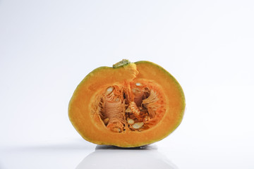 Sweet orange pumpkin isolated on white.