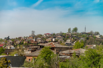 Fototapeta na wymiar Panorama view on Kutaisi city, Georgia at the noon.Vivid image.