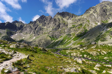 Fototapeta na wymiar Great mountain peaks above the valley. High Tatras. Slovakia