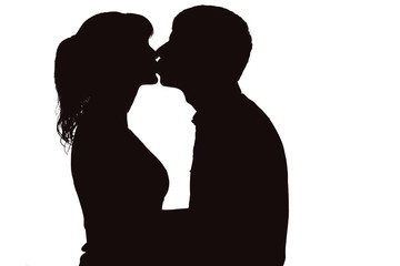 Silhouette of kissing couple