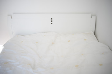 Close up white bedding sheets
