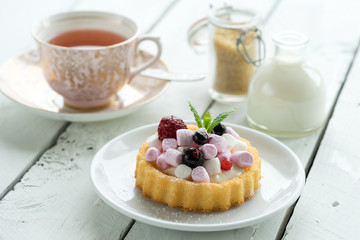 old school style tea at five afternoon service set cake sweet traditional table hotel cheesecake sugar pot china cup