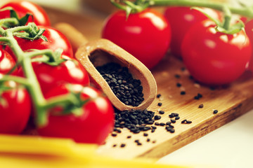 Kitchen Background Cooking Food Concept. Closeup of Cooking Process. Vegetables on Table. Cooking of Italian Pasta. Toning.