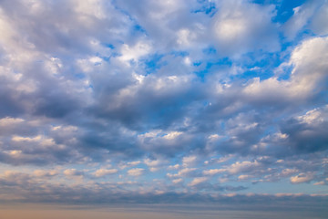 Naklejka na ściany i meble Dawn sky in the clouds as a background