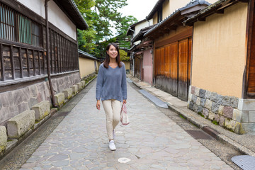 Young woman walking in Kanazawa city