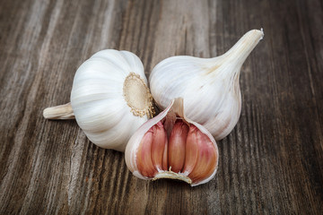 Fresh garlic on a wooden background