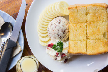 Toast and ice cream and banana dessert in cafe