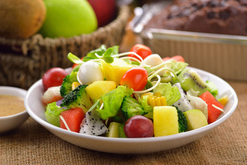vegetable salad bowl on wooden background