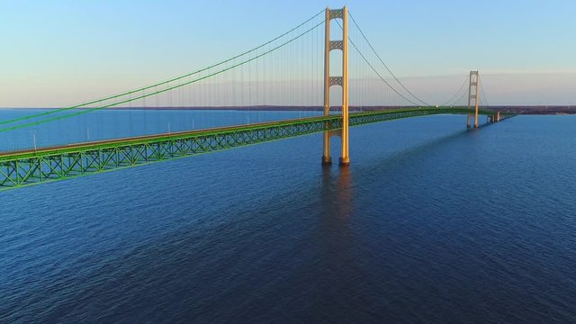 Breathtaking, majestic Mackinac Bridge, sunset aerial view, Upper Peninsula of Michigan.