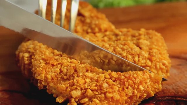 Chicken schnitzel in breaded chops cut