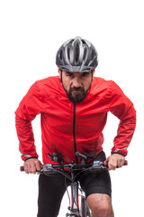 Fototapeta na wymiar Portrait of bicyclist with helmet and red jacket, riding a bicycle, isolated on white