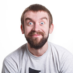 Fototapeta premium Man expressing wonder and happiness on face