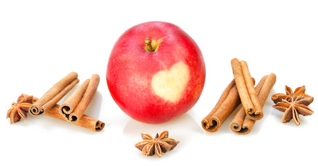 Red apple with heart, cinnamon, anise