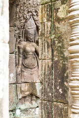 Apsara old stone statue in Bayon temple, Angkor Wat, Siem Reap, Cambodia