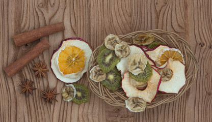 Exotic dried fruits on a wooden table