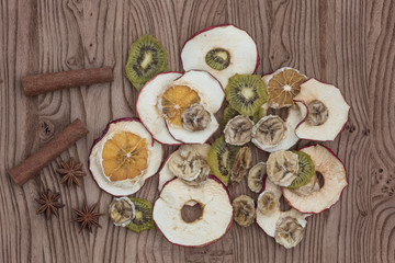 Exotic dried fruits on a wooden table