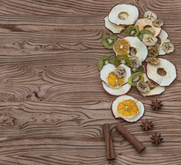 Exotic dried fruits on a wooden table