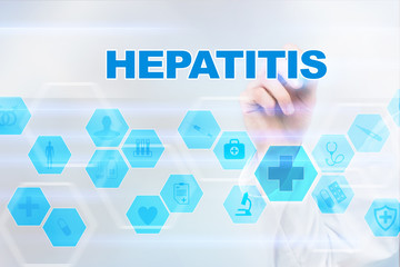 Medical doctor drawing hepatitis on the virtual screen.