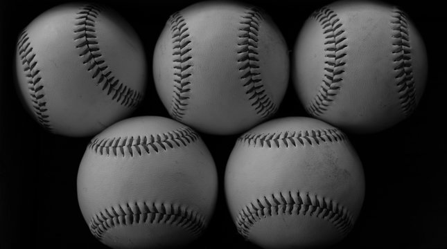 Baseball image for sports background, can see balls with vintage game appeal.  Represents the american sport lifestyle in black and white.